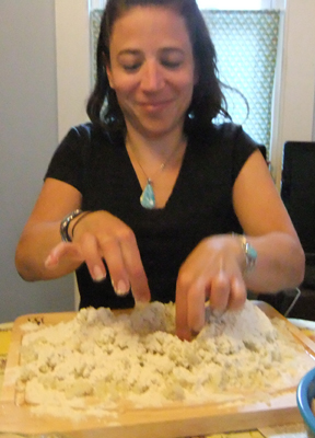 Dorrie poking the dough. We had way too much fun with the directions on this one.