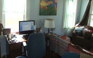 My former office at home. Cute but having to have it in my living room meant I had to create my own work-life boundaries. You can too.
