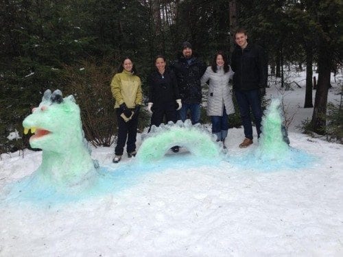 The winning sculpture and its creators.
