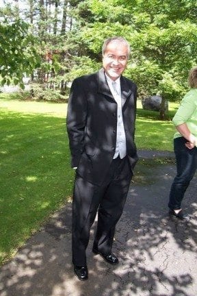 This is my dad before my sister's wedding. I was going to post this picture of him making a stupid face I took right before this but I want you to see that he's kind of handsome.